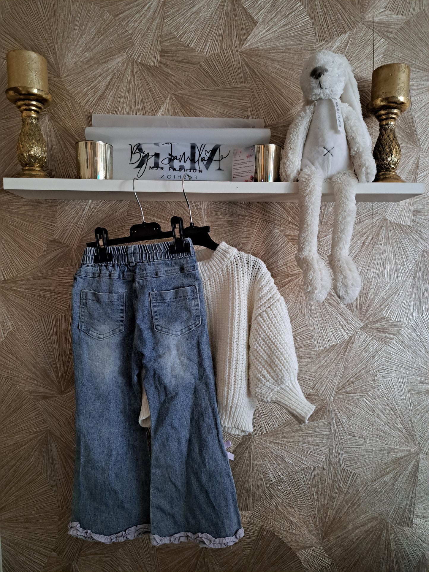 Gebreide trui + leuke jeans met paars roezeltje 🤍🟣